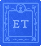 A blue book with a person's silhouette and flower details and the letters ET on the cover