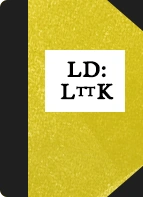 A yellow book with the letters LD: LttK on the cover